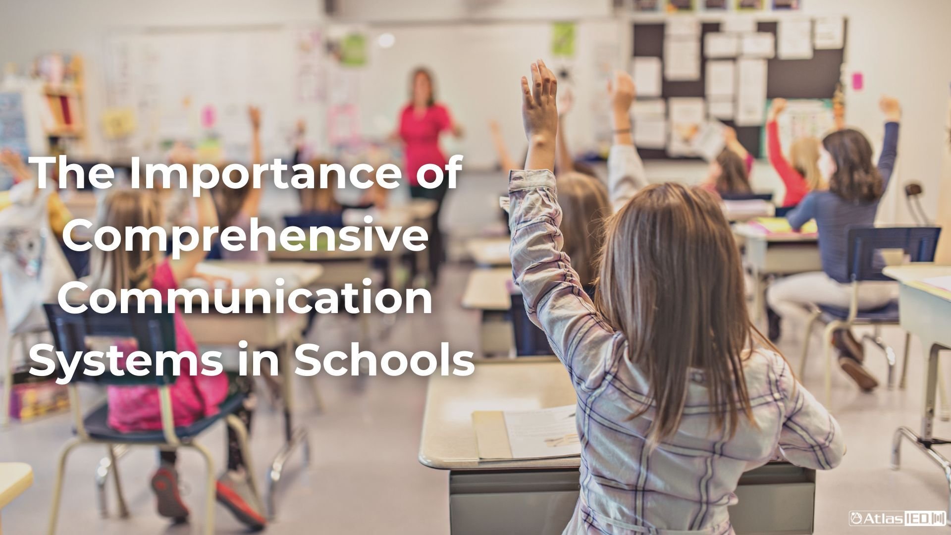 Elementary school classroom with students raising their hand