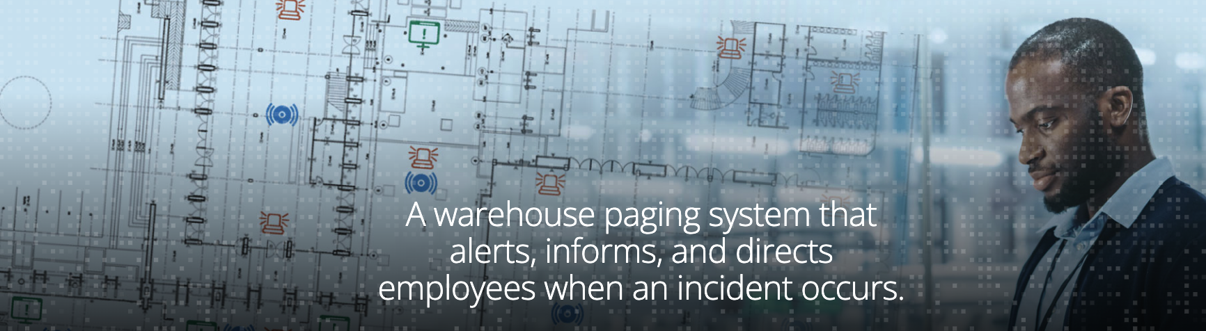 professional employee looking at the building plan to utilize a warehouse paging system to alert employees